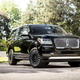 Illustration for article titled Only When The Extended-Length Lincoln Navigator Is 50 Feet Long Will America Return To Greatness